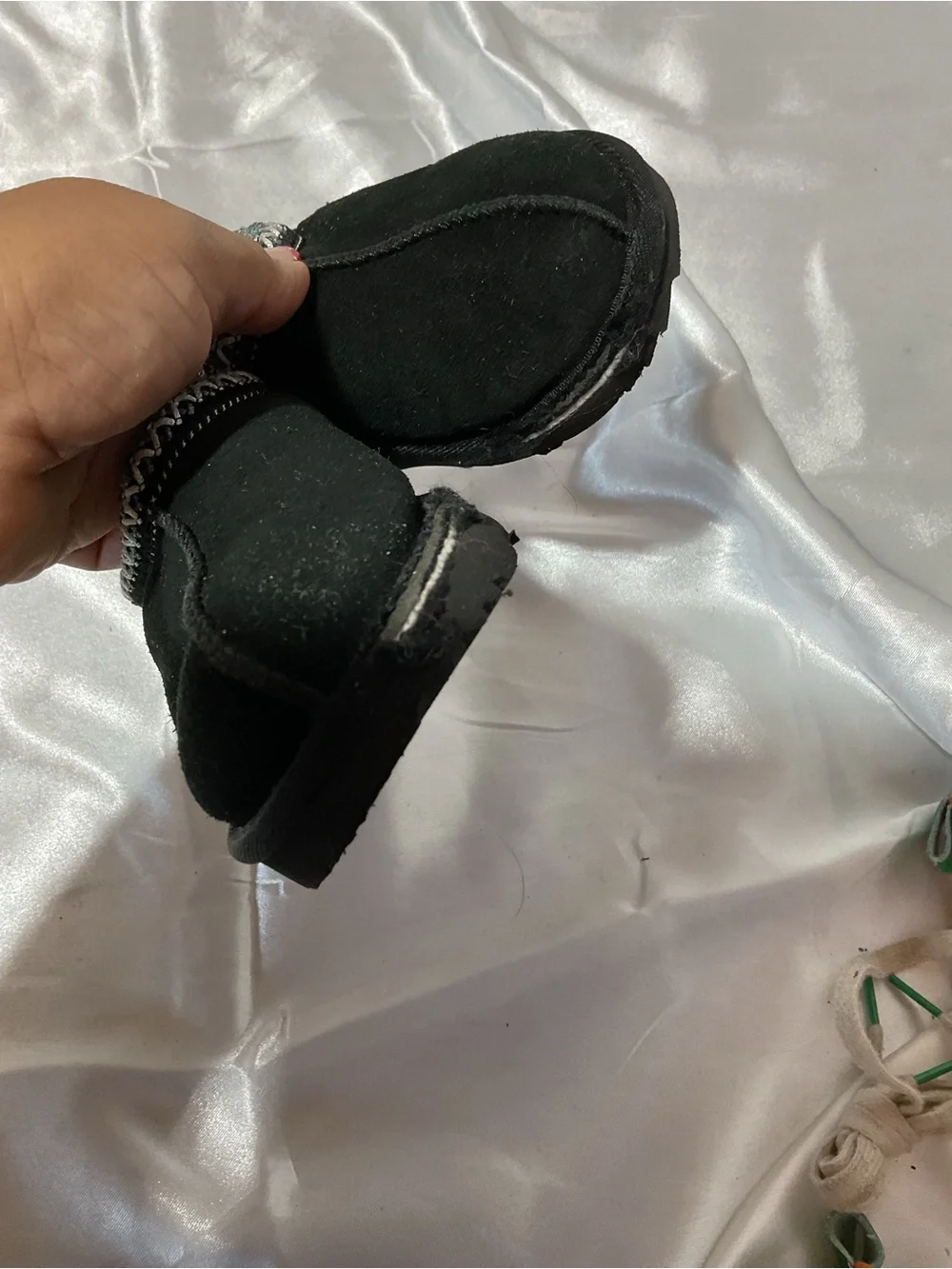 Kids Black Cozy Slip-On Shoes with Decorative Trim It is torn to shreds—heaps of